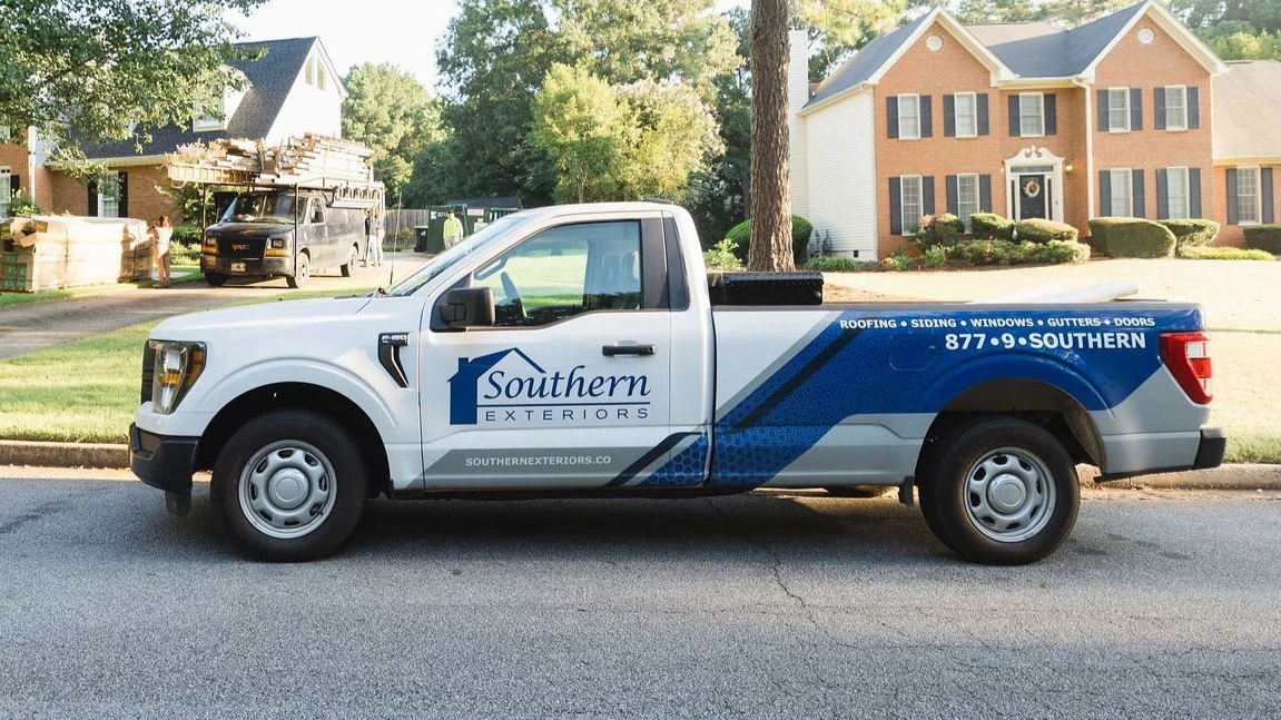A Southern Exteriors work truck parked in a residential neighborhood. A Southern Exteriors work truck parked in a residential neighborhood.
